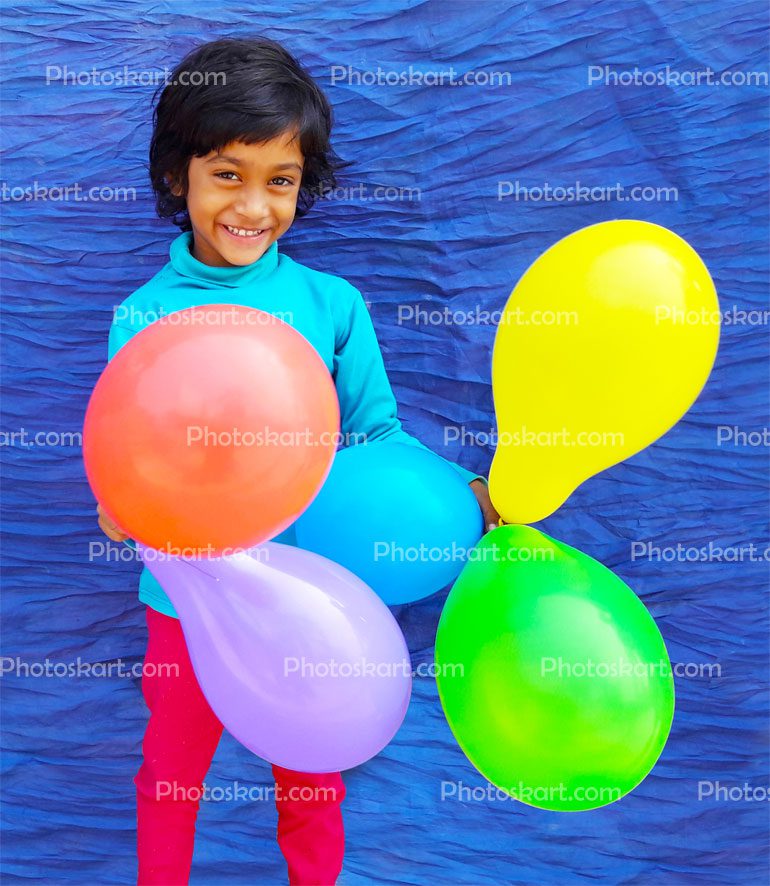 A Girl Play With Colourful Ballons