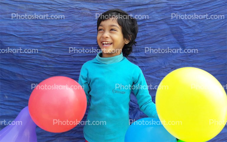A Cute Girl Play With Colourful Ballons