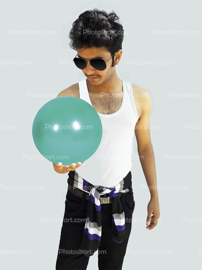 A Boy Standing With Ball