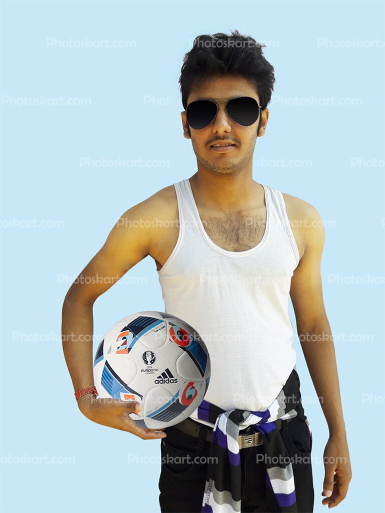A Boy Standing With Ball