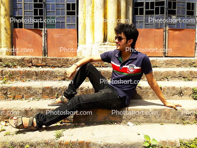 A Boy Sit Outdoor Stairs In Old Jamindar House