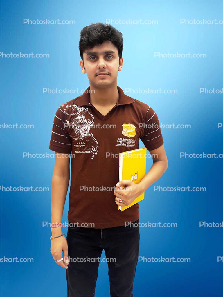 A College Student Standing With Book