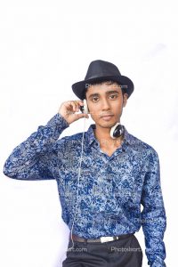 a-smart-boy-listening-music-with-headphone