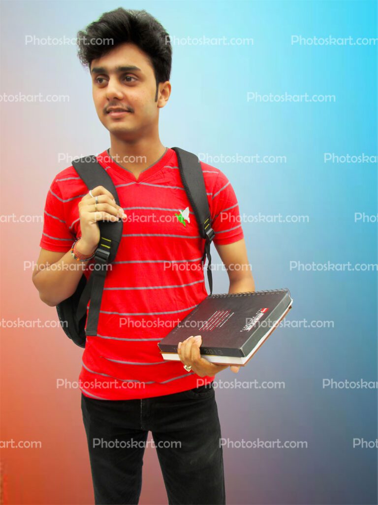A Student Standing With Red T Shirt And Books