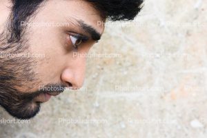 side-view-of-a-bearded-men-face-stock-photo