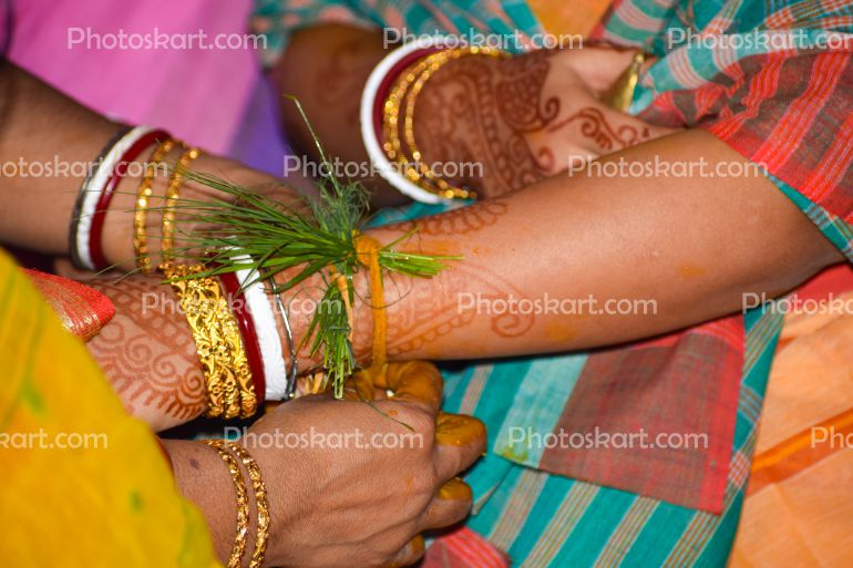 String Bind To Bride Hand In Bengali Wedding