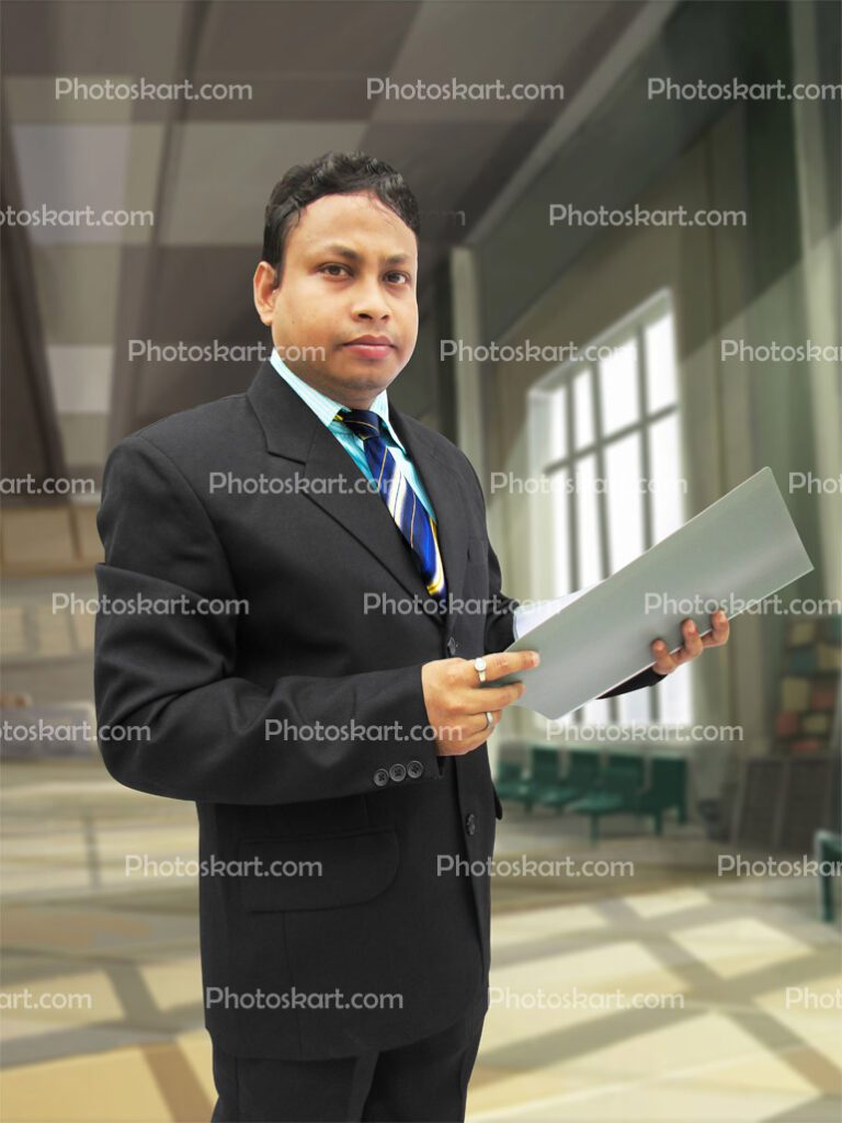 The Corporate Man Standing With File