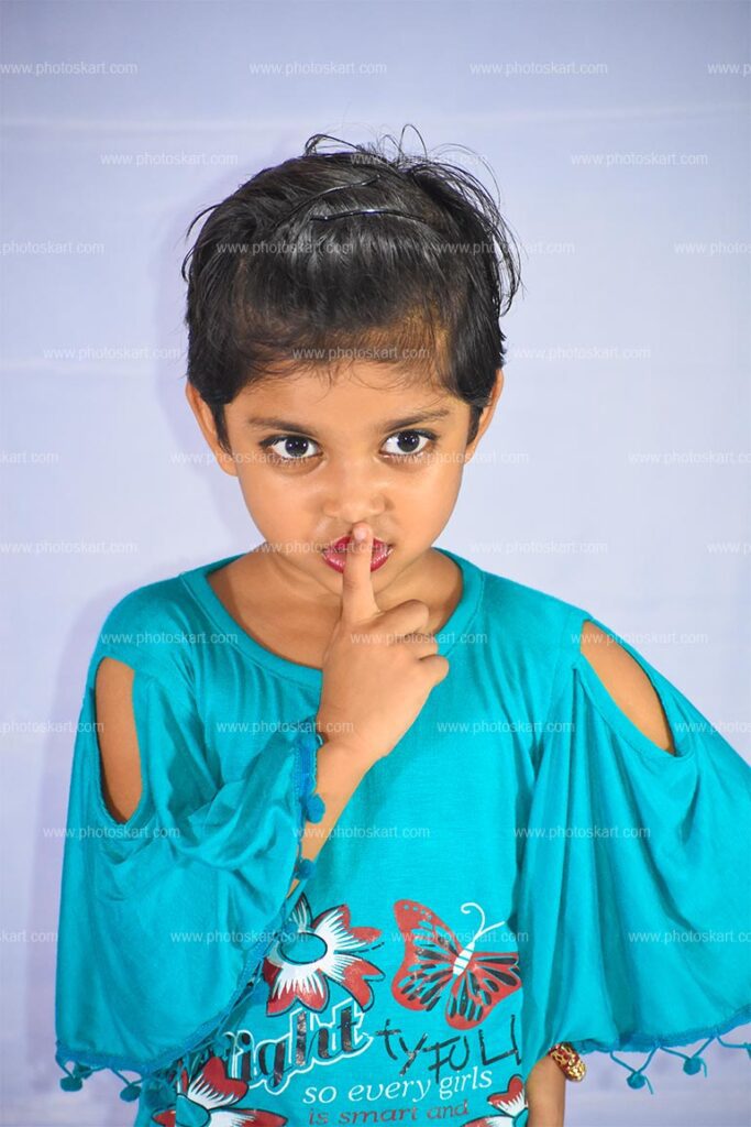 A Indian Little Girl Showing Keep Silence
