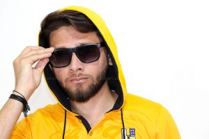 a-young-boy-wear-yellow-pullover-with-black-sunglass