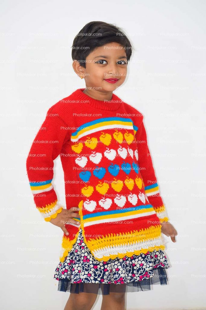 Standing A Beautiful Little Girl With Red Sweater