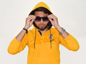 an-indian-boy-wearing-a-yellow-hood-jacket