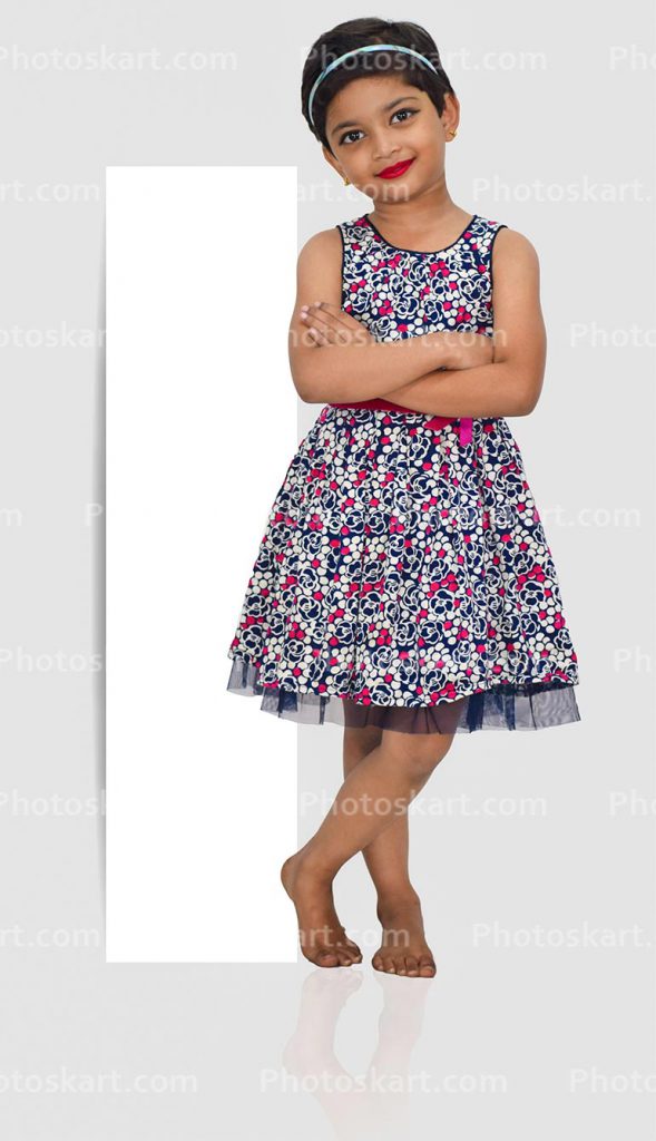 Cute Little Indian Girl Standing With Legs Folded