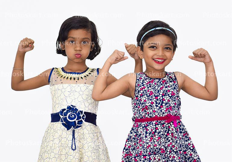 Two Child Girl Showing Her Hand Biceps