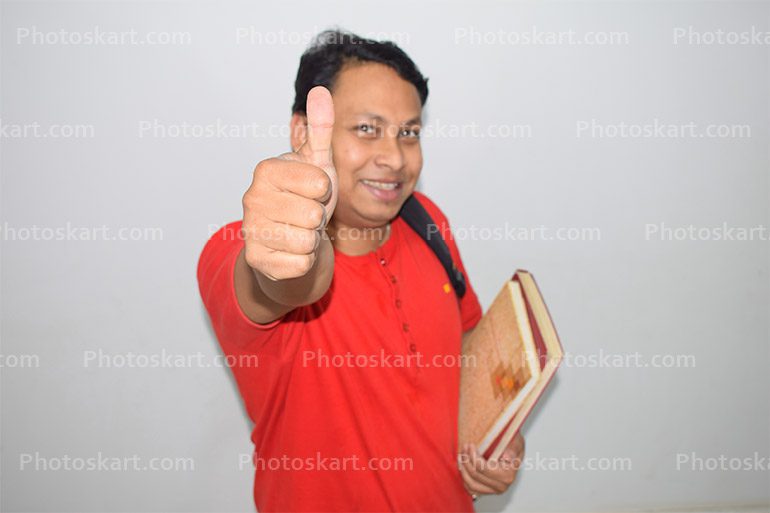 Smiley Student Showing Thumbs Up With Red Tshirt