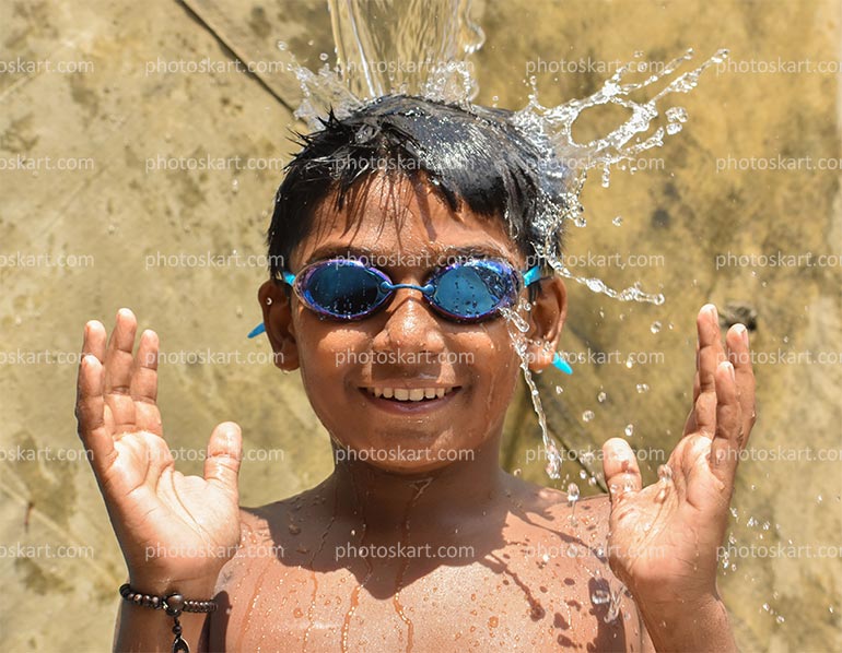 DG00110419 , New, a swimmer boy enjoy with water, an indian boy, an indian little boy, a boy wear swimming glass, a boy wears blue swimming glass, a swimmer boy enjoy with water, serampore photography, stock images, Indian stock images, royalty images, photoskart, free HD image, free commercial 