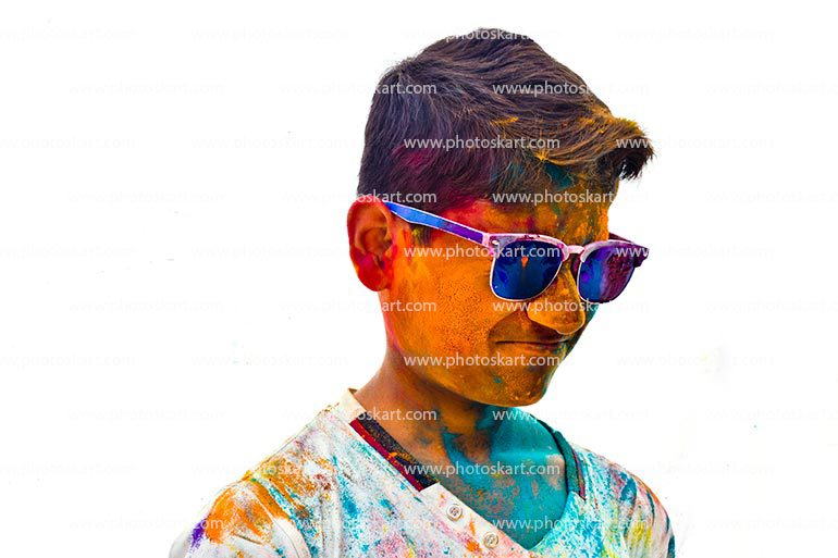 Happy Young Indian Boy Covered In Coloured Powder In White Background