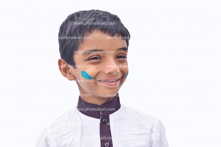 A Happy Smiling Boy On Indian Festival Holi Isolated On White Background