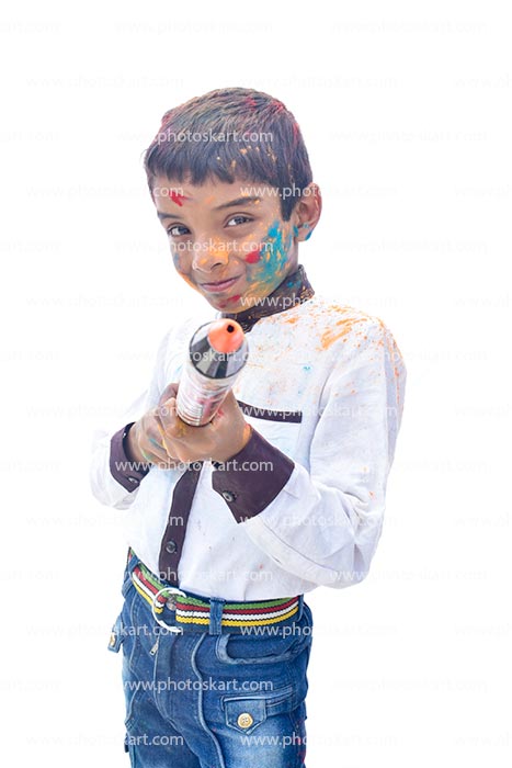 A Smiling Boy On Holi Hold A Pichkari Stock Images