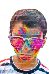 indian-boy-enjoying-holi-with-sunglasses-stock-photos