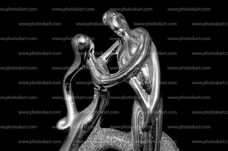 Dancing Couple Metal Doll Stock Photo With Black Background