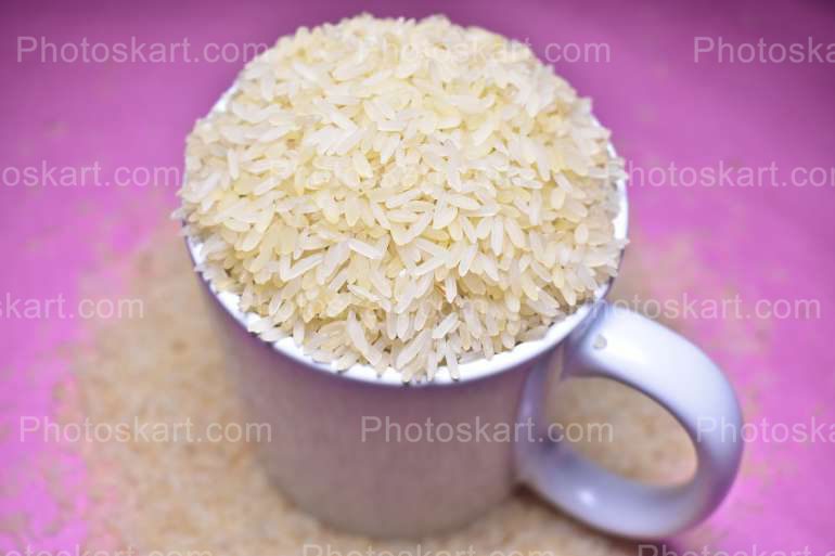 Full Mug Of Rice With Violet Background