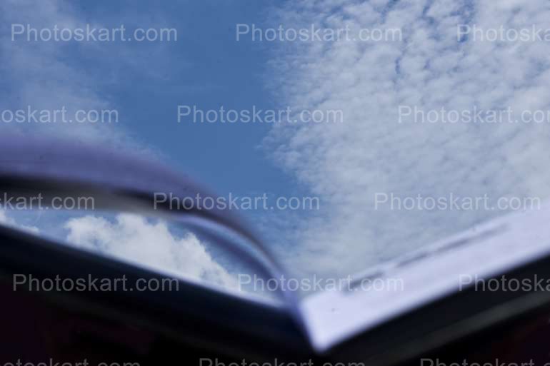 Open Book Under Blue Sky Reading Concept Stock Image