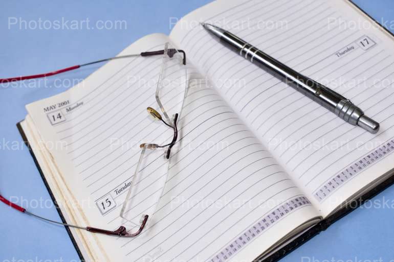 Open Diary Pen And Glasses Stock Image