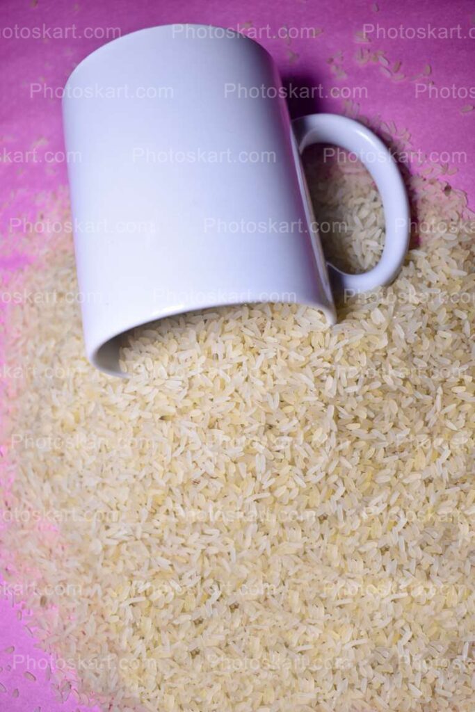 Rice Falling From White Mug Photograhy