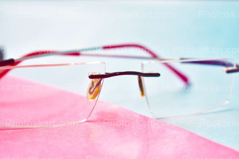 Rimless Spectacle Photoshoot With Colourful Background