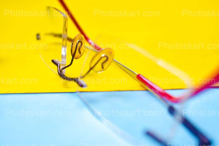 Rimless Spectacle With Yellow And Sky Background