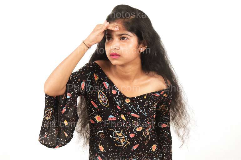 Portrait Of Curious Indian Girl Searching For Something
