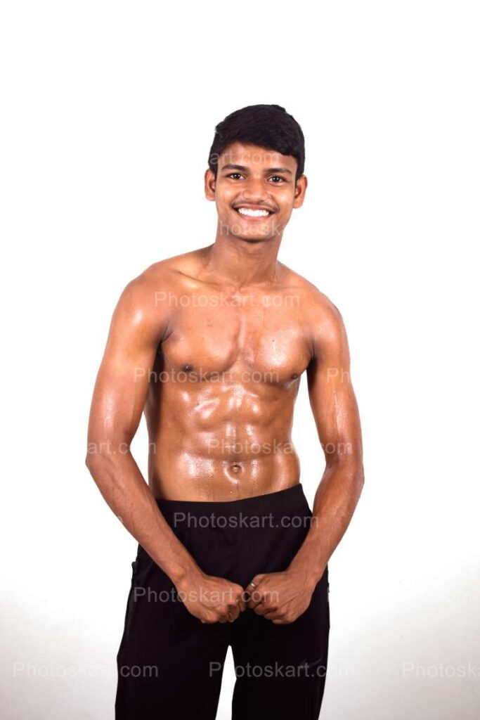 A Handsome Young Indian Boy Showing His Body