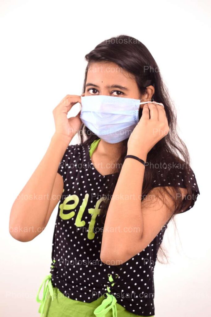 A Mask Wired Indian Teenage Girl Royalty Free Stock Image