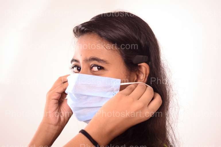 A Young Indian Bengali Woman Wearing Mask Stock Image
