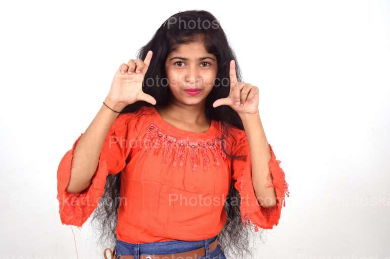 A Young Indian Cute Girl Making Face Stock Image