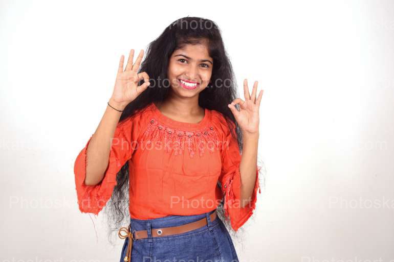 A Young Indian Girl Making Hand Gesture