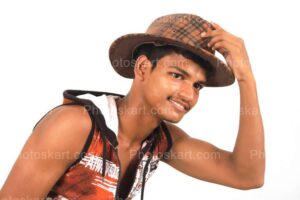 an indian boy with cowboy hat