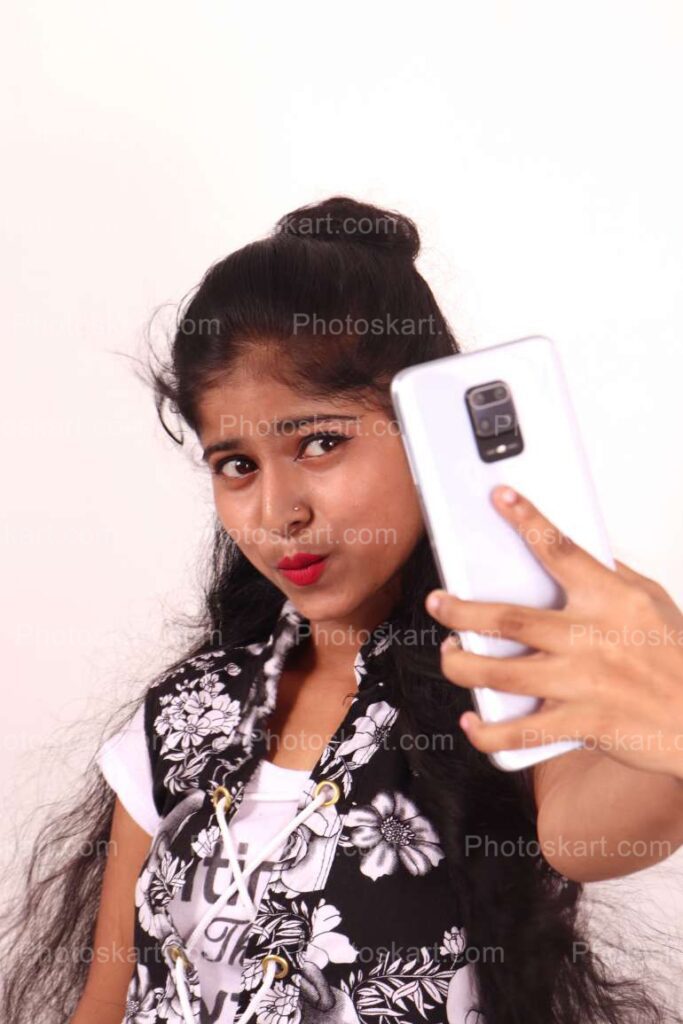 An Indian Girl Taking Selfi Stock Image