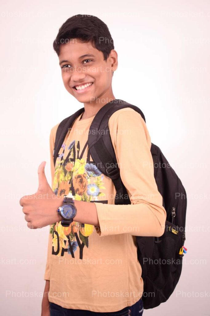 An Indian Boy Showing Thumb Hand Gesture