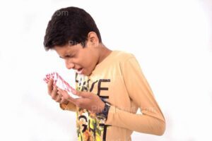 an-indian-boy-suffring-from-cough-and-cold-stock-image