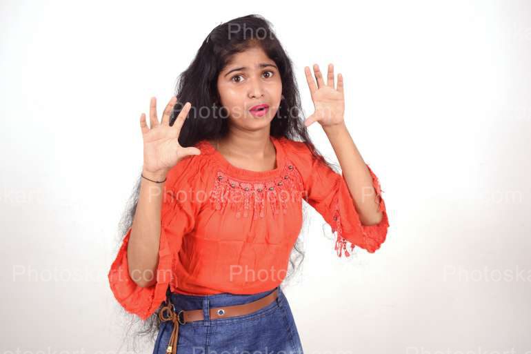 An Indian Girl Making Bear Gesture With Her Hand