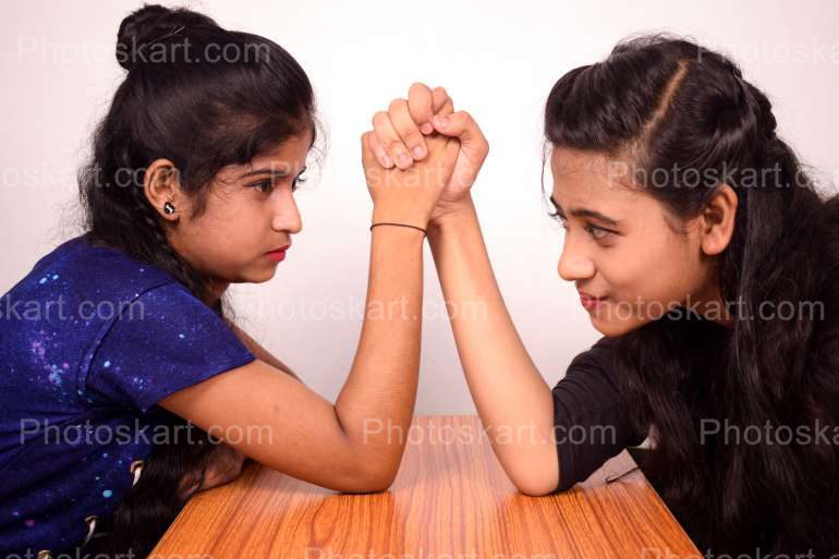 Two Young Indian Girl Busy In Panja Fighing Stock Image