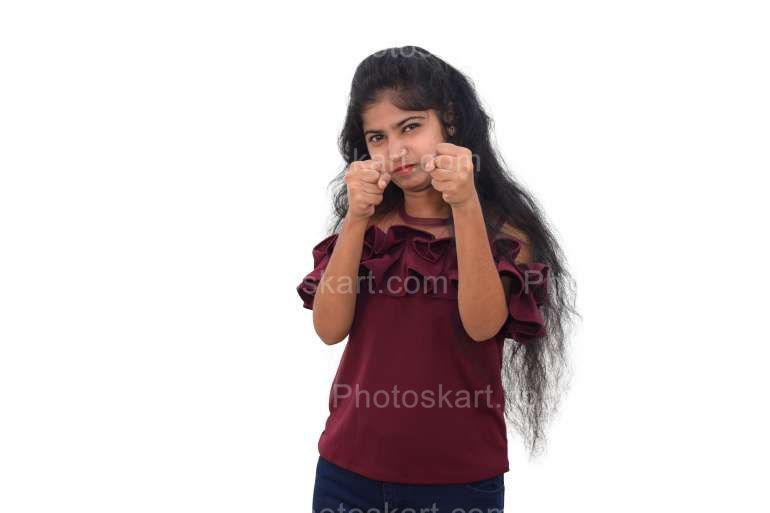 Cute Teenage Indian Girl Punching With Both Hands Isolated On A White Background