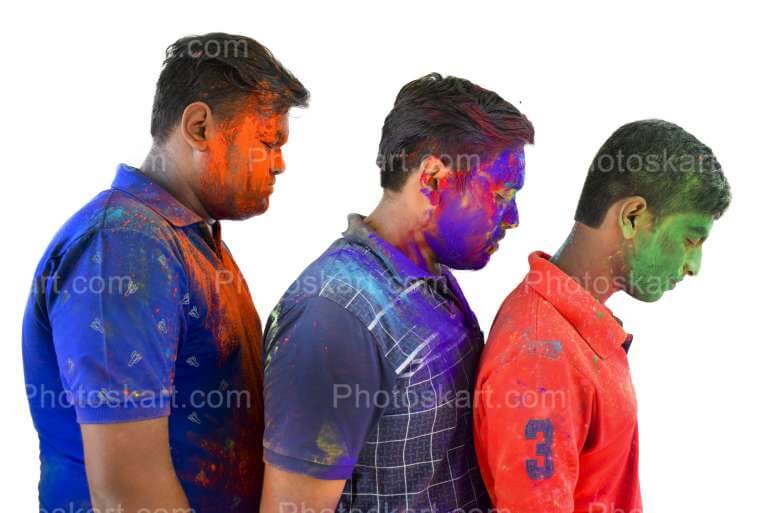 Group Of Indian Boys Standing With Coloured Face Stock Photo