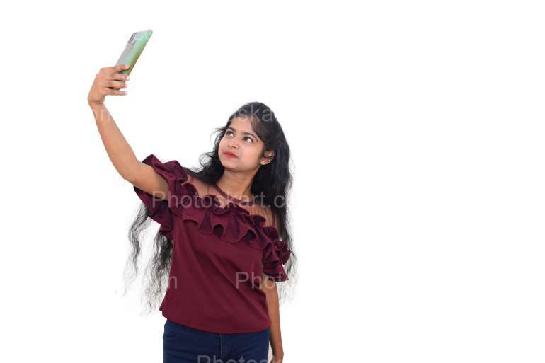 Image Of A Happy Indian Cute Girl Taking Selfie