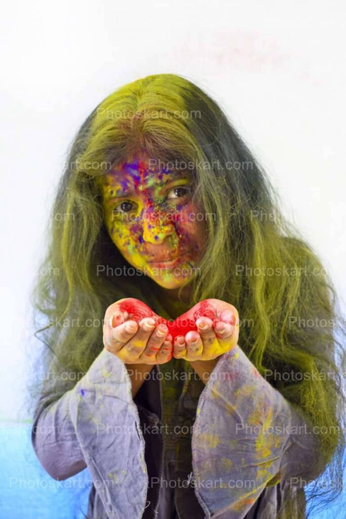 Portrait Of Indian Girl With Colored Face Stock Photo