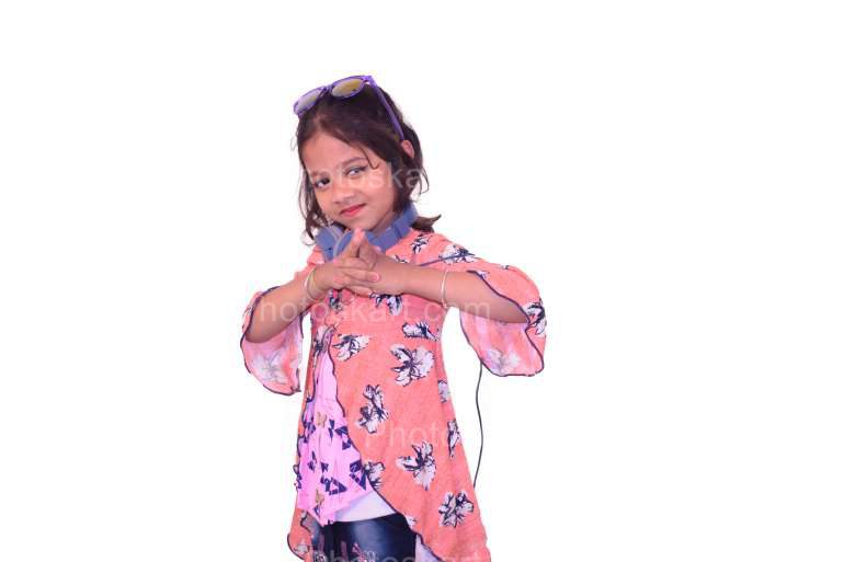 A Little Girl With Sunglasses And Headphone In Party Mood