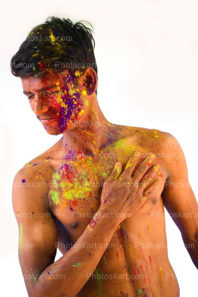 An Indian Bengali Boy Showing His Body In Holi Festival