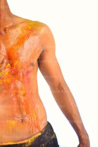 an-indian-boy-showing-his-body-during-holi-festival