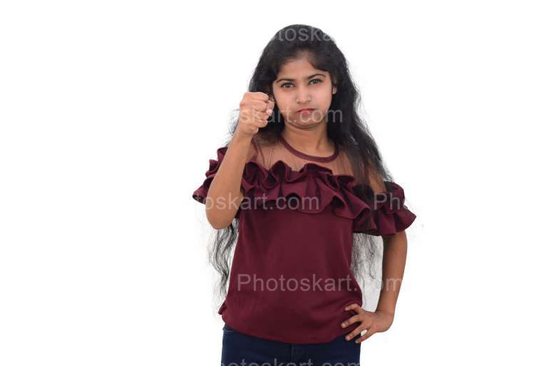 An Indian Young Girl Punching With One Hand High Resolution Stock Image